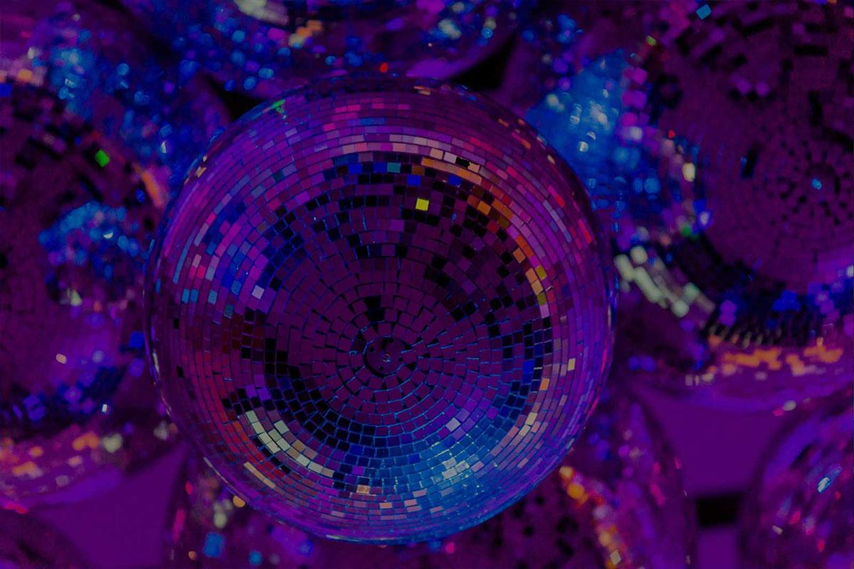 sparkly disco balls with purple hues